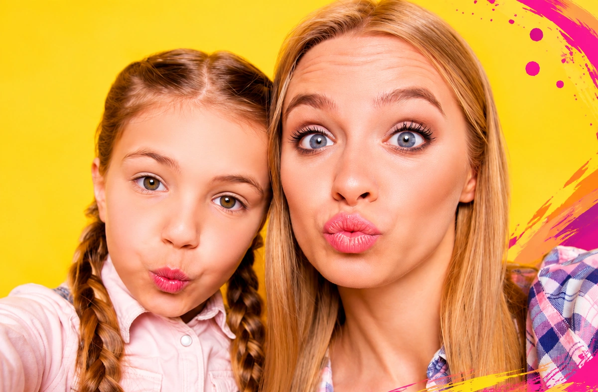 Mother and daughter having fun together against a bright yellow background